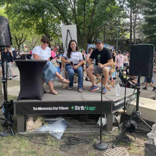 Change the Outcome team members Hanna Kazempour and Megan Wagner sit with Minnesota Star Tribune Reporter Reid Forgrave for an interview at the Minnesota State Fair